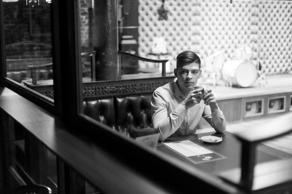 a man sat in a restaurant