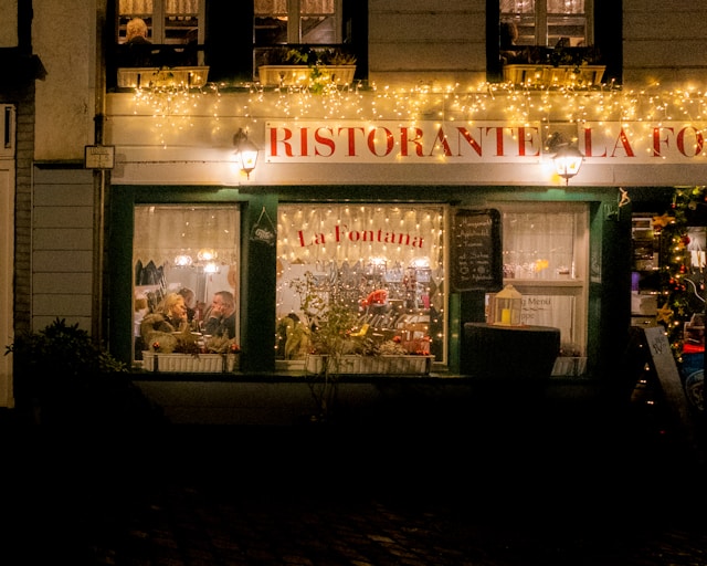 outside of a restaurant at Christmas time